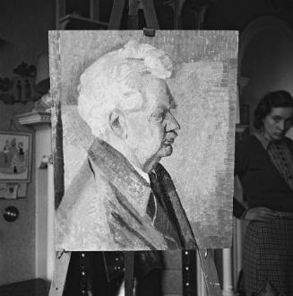 Portrait of Henry Crowe Esq. on easel. Alva St studio. Wilhelmina Barns-Graham in background looking at easel.