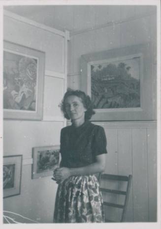 Wilhelmina Barns-Graham standing in exhibition.[Penwith, Fore Street?]