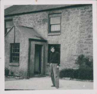 David Lewis, standing outside Higher Tregerthen house in Zennor