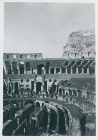 Inside of the Colloseum, Rome, with floor, stadium and sky visible