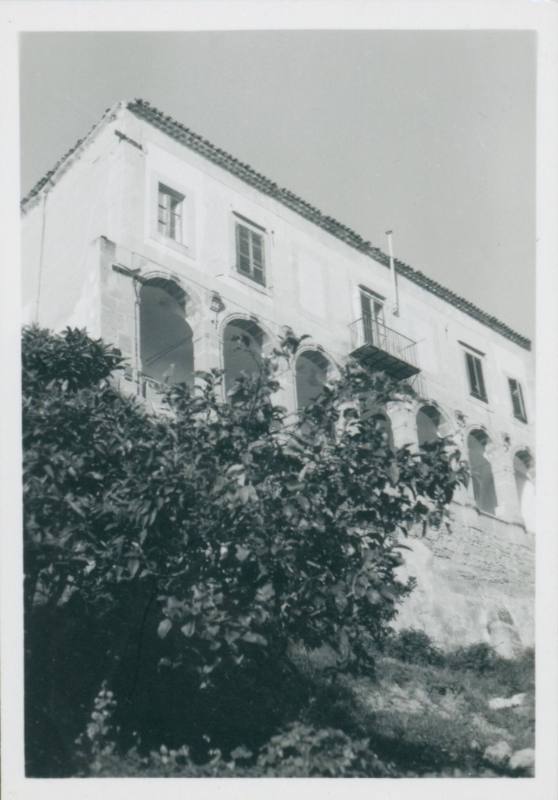 View of front terrace and porch of Villa Maggiacomo, Palermo, with tree in front