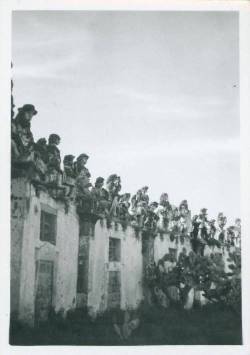 Extended row of statues atop the wall of the Villa Palagonia, Bagheria