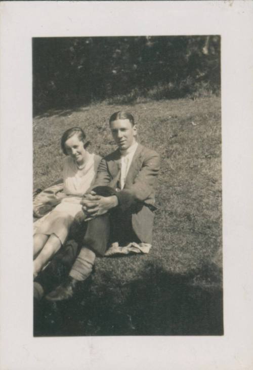 Wilhelmina Barns-Graham and Denis Peploe sitting on grass. ECA.