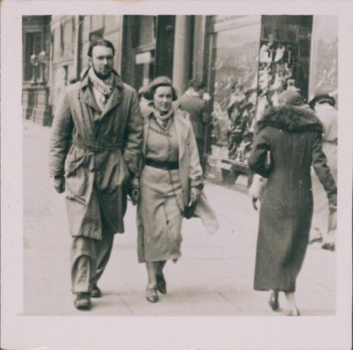 Wilhelmina Barns-Graham and Denis Peploe walking down street, Edinburgh. [Walking photo].