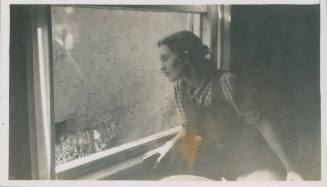 Wilhelmina Barns-Graham looking out window.