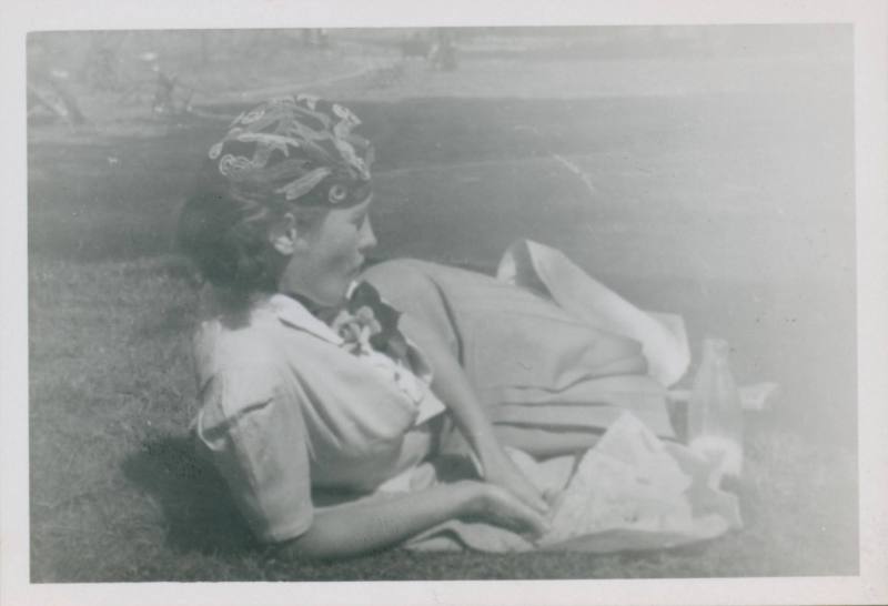 Wilhelmina Barns-Graham reclining with picnic. Signed Per Hektoen.[Possibly in London]