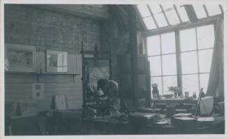 Wilhelmina Barns-Graham painting a flower still life. No. 3 Porthmeor studios.