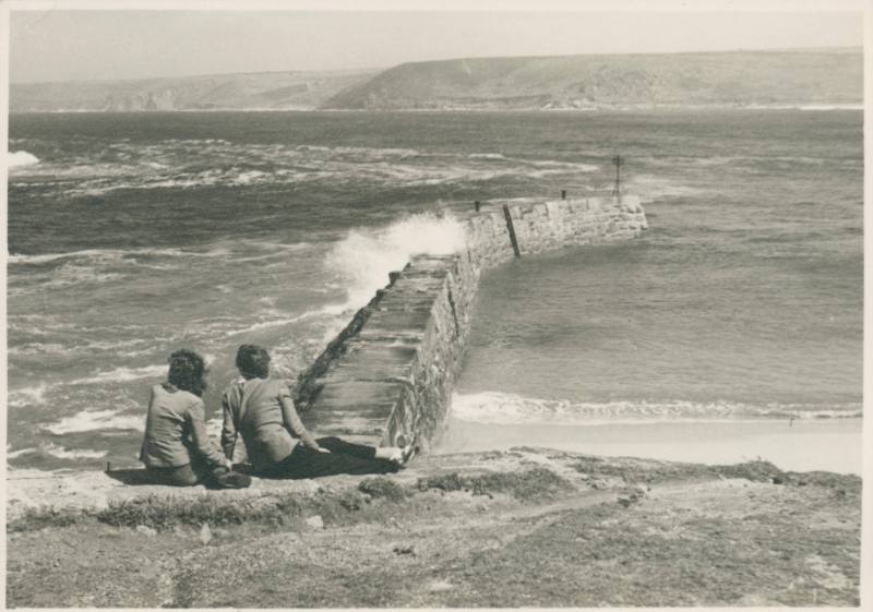 Wilhelmina Barns-Graham and woman, sitting on beach looking out to sea [possibly Cornwall]