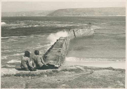 Wilhelmina Barns-Graham and woman, sitting on beach looking out to sea [possibly Cornwall]