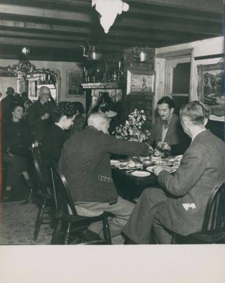 Wilhelmina Barns-Graham and others at the Copper Kettle, St Ives. Information on reverse [Central Office of Information]