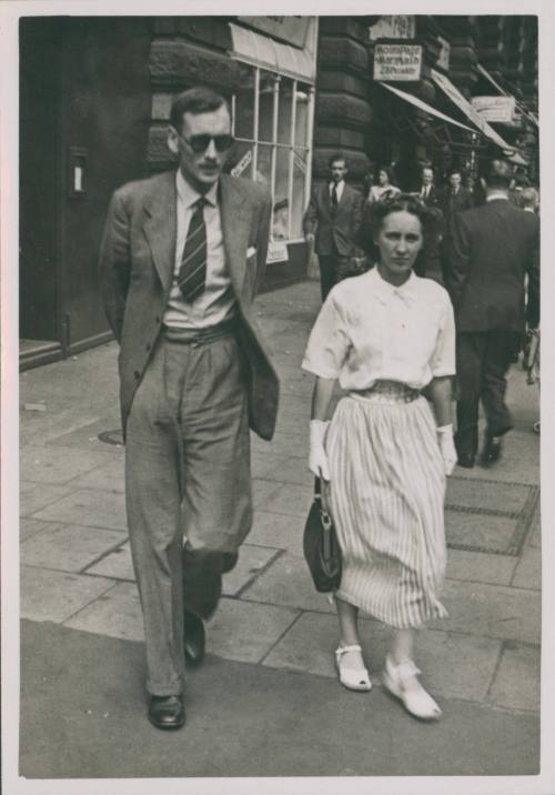 Wilhelmina Barns-Graham and Patrick Barns-Graham on Piccadilly, London. [Walking photo]