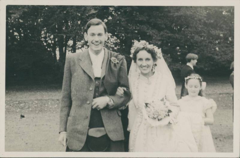 David Lewis and Wilhelmina Barns-Graham smiling at the camera.