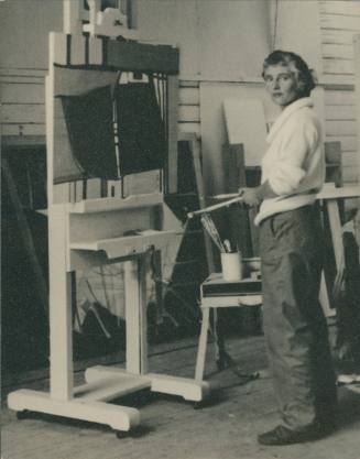 Wilhelmina Barns-Graham standing at easel. No. 1 Porthmeor Studios.