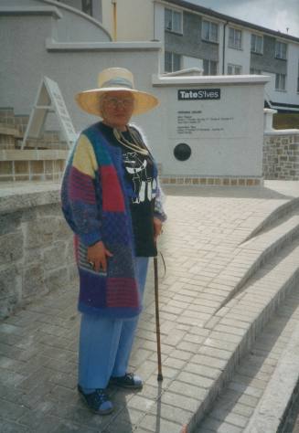 Wilhelmina Barns-Graham standing in front of Tate St Ives.